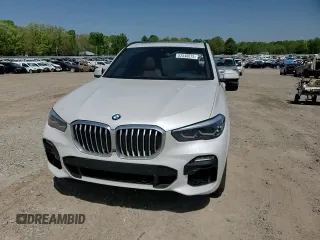 2019 BMW X5 xDrive40i z VIN 5UXCR6C50KLL13255, wystawiony jako Copart lot #52546675 z przebiegiem 80 686 mil mil oraz Szkoda całkowita • Salvage title. Historia ofert i sprzedaży dostępna na DreamBid. Obrazek 12.