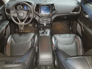 2022 Jeep Cherokee Latitude Lux z VIN 1C4PJMMX0ND502033, wystawiony jako Copart lot #59656985 z przebiegiem 21 055 mil mil oraz Szkoda całkowita • Salvage title. Historia ofert i sprzedaży dostępna na DreamBid. Obrazek 8.