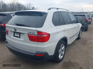 2009 BMW X5 30i with VIN 5UXFE43599L268484, listed as a IAAI auction lot 41656318 with 140,025 mi miles. Bid and sale history available at carsss.com. Image 4.