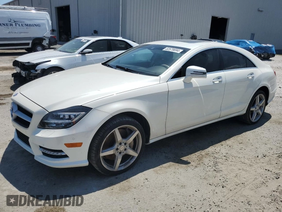 2014 Mercedes-Benz CLS-Class CLS 550 with VIN WDDLJ7DB1EA107497, listed as a Copart auction lot 52579694 with 99,752 mi miles and Salvage Title. Bid and sale history available at carsss.com. Image 1.