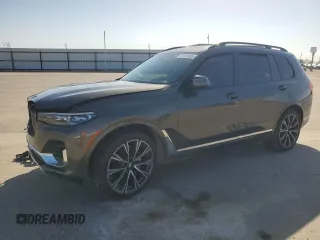 2021 BMW X7 xDrive40i z VIN 5UXCW2C04M9F03701, wystawiony jako Copart lot #52409985 z przebiegiem Nie podano mil oraz Szkody całkowita. Historia ofert i sprzedaży dostępna na DreamBid. Obrazek 1.
