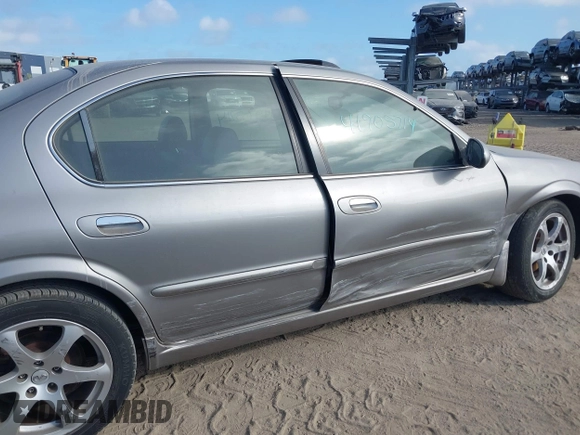 2003 Nissan Maxima GLE z VIN JN1DA31A83T411224, wystawiony jako IAAI lot #41905714 z przebiegiem Nie podano mil oraz . Historia ofert i sprzedaży dostępna na DreamBid. Obrazek 6.