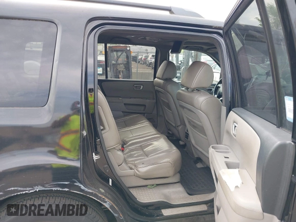 2011 Honda Pilot EX-L with VIN 5FNYF4H61BB078003, listed as a IAAI auction lot 42181724 with 327,236 mi miles and . Bid and sale history available at carsss.com. Image 8.