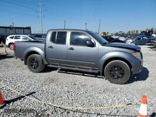 2018 Nissan Frontier PRO-4X with VIN 1N6AD0EV7JN766614, listed as a Copart auction lot 76400834 with 180,560 mi miles and Salvage Title. Bid and sale history available at carsss.com. Image 4.