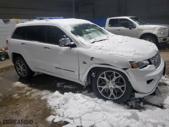2021 Jeep Grand Cherokee Overland with VIN 1C4RJFCGXMC530867, listed as a Copart auction lot 44593335 with 73,483 mi miles and Salvage Title. Bid and sale history available at carsss.com. Image 4.