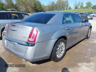 2013 Chrysler 300 C with VIN 2C3CCAEG7DH727559, listed as a IAAI auction lot 41990806 with 201,182 mi miles and . Bid and sale history available at DreamBid. Image 4.