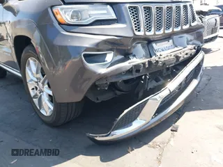 2014 Jeep Grand Cherokee Summit with VIN 1C4RJFJG8EC434899, listed as a IAAI auction lot 42399912 with 186,840 mi miles and . Bid and sale history available at DreamBid. Image 12.