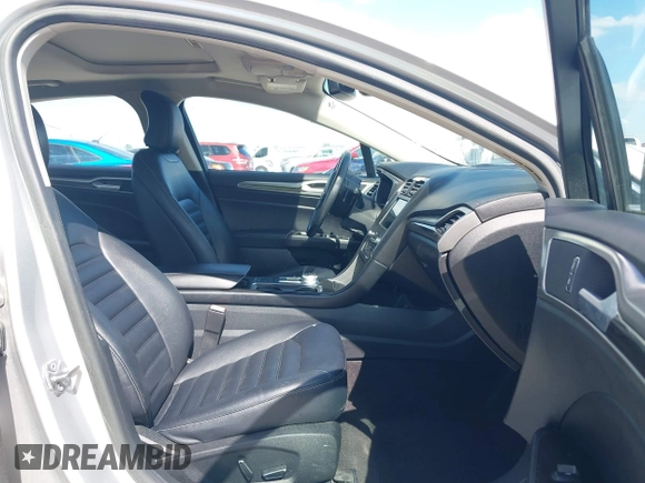2019 Ford Fusion SEL with VIN 3FA6P0CD2KR116863, listed as a IAAI auction lot 42011256 with 72,676 mi miles. Bid and sale history available at carsss.com. Image 5.