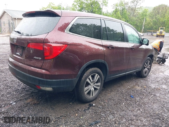2016 Honda Pilot EX-L with VIN 5FNYF6H5XGB007876, listed as a IAAI auction lot 42366901 with 128,580 mi miles and . Bid and sale history available at DreamBid. Image 4.