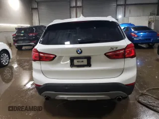 2016 BMW X1 xDrive28i with VIN WBXHT3C3XG5E51117, listed as a Copart auction lot 48243355 with 129,607 mi miles and Salvage Title. Bid and sale history available at carsss.com. Image 6.