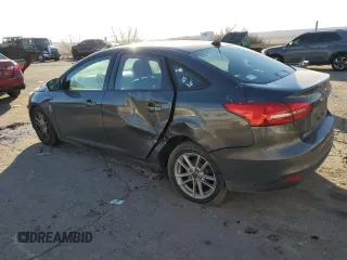 2016 Ford Focus SE with VIN 1FADP3F20GL346250, listed as a Copart auction lot 42645315 with 92,534 mi miles and Salvage title. Bid and sale history available at DreamBid. Image 2.