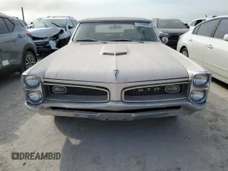 1966 Pontiac GTO z VIN 242676P246352, wystawiony jako Copart lot #75298684 z przebiegiem 79 942 mil mil oraz Szkoda całkowita • Salvage title. Historia ofert i sprzedaży dostępna na DreamBid. Obrazek 5.