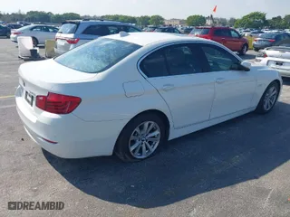 2014 BMW 5 Series 528i with VIN WBA5A5C56ED511751, listed as a IAAI auction lot 41450792 with 134,218 mi miles. Bid and sale history available at carsss.com. Image 4.
