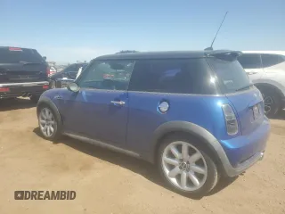 2005 MINI Hardtop S with VIN WMWRE33415TD90833, listed as a Copart auction lot 61238165 with 174,647 mi miles and Salvage title. Bid and sale history available at DreamBid. Image 2.