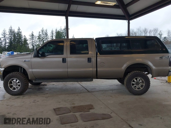 2002 Ford Super Duty F-250 XL with VIN 1FTNW21F92EB00672, listed as a IAAI auction lot 41699748 with 134,137 mi miles. Bid and sale history available at carsss.com. Image 14.