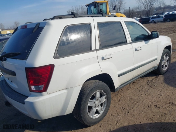 2007 Jeep Grand Cherokee Laredo with VIN 1J8HR48N97C692969, listed as a IAAI auction lot 41798961 with 167,432 mi miles. Bid and sale history available at carsss.com. Image 4.
