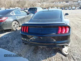2019 Ford Mustang EcoBoost with VIN 1FA6P8TH8K5173458, listed as a IAAI auction lot 41085251 with 99,260 mi miles and . Bid and sale history available at carsss.com. Image 16.
