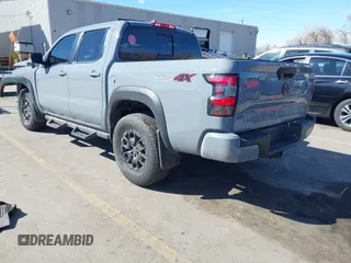 2023 Nissan Frontier SV with VIN 1N6ED1EK2PN633278, listed as a IAAI auction lot 41854671 with 59,549 mi miles and . Bid and sale history available at DreamBid. Image 3.