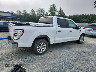 2021 Ford F-150 XL with VIN 1FTEW1C53MFB80059, listed as a Copart auction lot 58835805 with 85,998 mi miles and Salvage title. Bid and sale history available at DreamBid. Image 3.