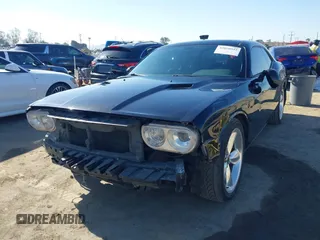 2014 Dodge Challenger R/T z VIN 2C3CDYBT2EH313789, wystawiony jako IAAI lot #42020945 z przebiegiem 182 788 mil mil oraz . Historia ofert i sprzedaży dostępna na DreamBid. Obrazek 2.