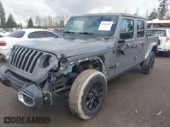 2021 Jeep Gladiator Willys with VIN 1C6HJTAG5ML616706, listed as a IAAI auction lot 41367142 with 50,951 mi miles and . Bid and sale history available at carsss.com. Image 2.