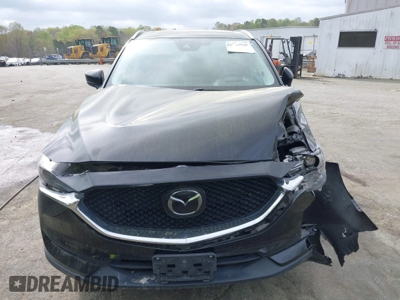 2018 Mazda CX-5 Grand Touring with VIN JM3KFBDM1J0358197, listed as a IAAI auction lot 41967940 with 148,119 mi miles and . Bid and sale history available at DreamBid. Image 12.