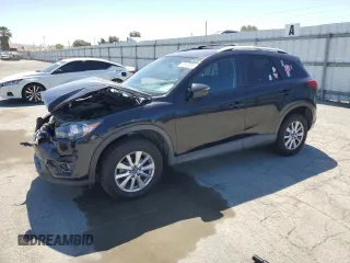 2016 Mazda CX-5 Touring z VIN JM3KE2CY2G0863746, wystawiony jako Copart lot #57678295 z przebiegiem 204 250 mil mil oraz Szkoda całkowita • Salvage title. Historia ofert i sprzedaży dostępna na DreamBid. Obrazek 1.