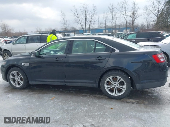 2013 Ford Taurus SEL with VIN 1FAHP2H80DG234999, listed as a IAAI auction lot 41577003 with 115,403 mi miles and . Bid and sale history available at DreamBid. Image 14.