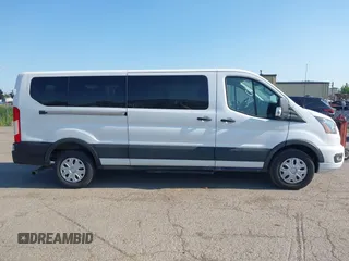 2023 Ford Transit Passenger XL with VIN 1FBAX2YG3PKA90941, listed as a IAAI auction lot 42472270 with 43,141 mi miles and . Bid and sale history available at DreamBid. Image 13.