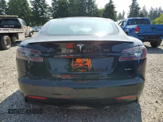 2021 Tesla Model S Plaid with VIN 5YJSA1E66MF434066, listed as a Copart auction lot 61648755 with Not provided miles and Salvage title. Bid and sale history available at DreamBid. Image 6.