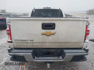 2018 Chevrolet Colorado 4WD Work Truck z VIN 1GCGTBEN3J1271023, wystawiony jako IAAI lot #41013812 z przebiegiem 124 032 mil mil oraz . Historia ofert i sprzedaży dostępna na DreamBid. Obrazek 17.