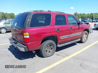 2004 Chevrolet Tahoe LS with VIN 1GNEC13Z74R207698, listed as a IAAI auction lot 42310462 with 255,218 mi miles and . Bid and sale history available at DreamBid. Image 4.
