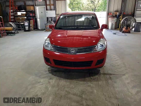 2009 Nissan Versa S with VIN 3N1BC13E39L418195, listed as a Copart auction lot 55244225 with 300,831 mi miles and Salvage title. Bid and sale history available at DreamBid. Image 14.