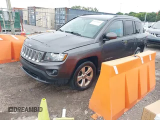 2016 Jeep Compass Latitude z VIN 1C4NJCEA2GD648240, wystawiony jako IAAI lot #42644443 z przebiegiem 189 370 mil mil oraz . Historia ofert i sprzedaży dostępna na DreamBid. Obrazek 2.
