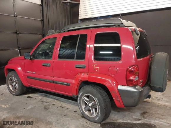 2004 Jeep Liberty Sport with VIN 1J4GL48K84W206909, listed as a IAAI auction lot 41465892 with 144,721 mi miles. Bid and sale history available at carsss.com. Image 6.