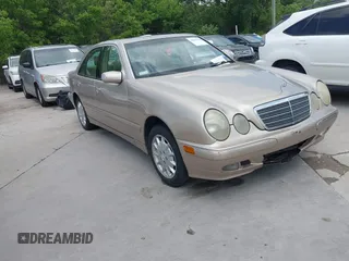 2000 Mercedes-Benz E-Class with VIN WDBJF82JXYX035704, listed as a IAAI auction lot 42045969 with 1 mi miles. Bid and sale history available at carsss.com. Image 1.