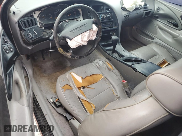 1997 Ford Thunderbird LX z VIN 1FALP62W7VH165149, wystawiony jako Copart lot #56654715 z przebiegiem 155 190 mil mil oraz Szkody całkowita. Historia ofert i sprzedaży dostępna na DreamBid. Obrazek 8.