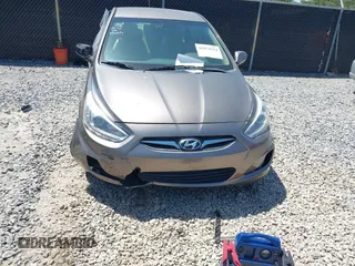 2014 Hyundai Accent GLS with VIN KMHCU4AE7EU736691, listed as a IAAI auction lot 42054514 with 80,715 mi miles and . Bid and sale history available at carsss.com. Image 13.