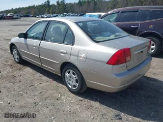 2002 Honda Civic LX with VIN 1HGES16542L069740, listed as a IAAI auction lot 41902478 with 146,627 mi miles. Bid and sale history available at carsss.com. Image 3.