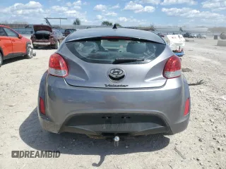 2014 Hyundai Veloster z VIN KMHTC6AD3EU215750, wystawiony jako Copart lot #52769165 z przebiegiem 114 364 mil mil oraz Szkoda całkowita • Salvage title. Historia ofert i sprzedaży dostępna na DreamBid. Obrazek 6.