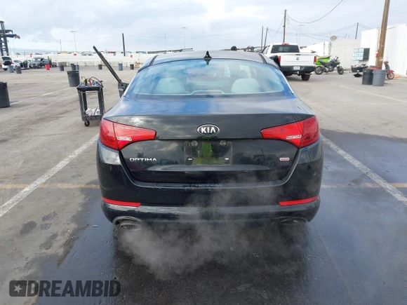 2013 Kia Optima LX z VIN 5XXGM4A74DG221272, wystawiony jako IAAI lot #41470828 z przebiegiem 76 452 mil mil oraz . Historia ofert i sprzedaży dostępna na DreamBid. Obrazek 16.