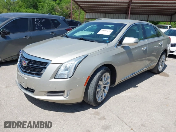 2016 Cadillac XTS Luxury Collection with VIN 2G61M5S31G9146455, listed as a IAAI auction lot 42019234 with 72,019 mi miles. Bid and sale history available at carsss.com. Image 2.