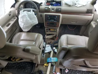 2004 Ford Freestar Limited с VIN 2FMDA58214BA91524, выставлен на аукционе Copart как лот 72140544 с пробегом Не указан миль и Списание • Salvage title. История ставок и продаж доступна на DreamBid. Изображение 8.