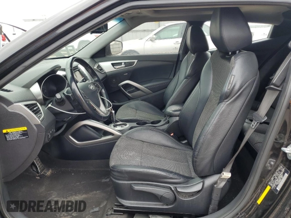 2014 Hyundai Veloster z VIN KMHTC6AD0EU188863, wystawiony jako Copart lot #54750925 z przebiegiem 96 212 mil mil oraz Szkoda całkowita • Salvage title. Historia ofert i sprzedaży dostępna na DreamBid. Obrazek 7.