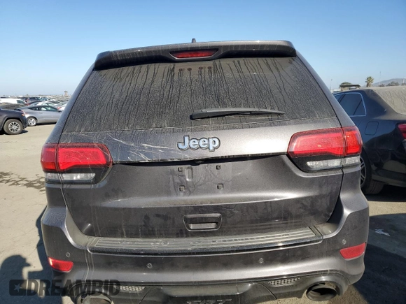 2017 Jeep Grand Cherokee SRT with VIN 1C4RJFDJ0HC645266, listed as a Copart auction lot 85089964 with 62,591 mi miles and Salvage Title. Bid and sale history available at carsss.com. Image 6.