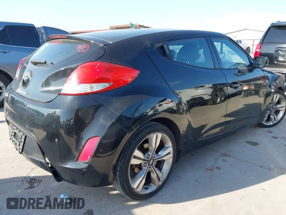 2013 Hyundai Veloster w/Black Int with VIN KMHTC6AD2DU171044, listed as a IAAI auction lot 42245907 with 140,542 mi miles and . Bid and sale history available at DreamBid. Image 4.