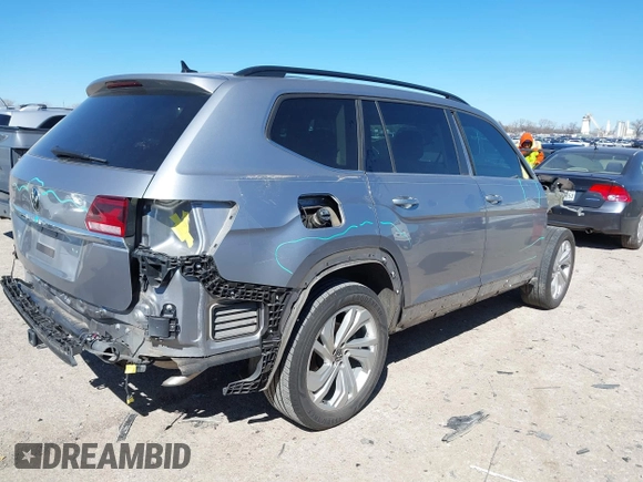 2023 Volkswagen Atlas SE z VIN 1V2JR2CA4PC526973, wystawiony jako IAAI lot #41712167 z przebiegiem 77 370 mil mil oraz . Historia ofert i sprzedaży dostępna na DreamBid. Obrazek 4.