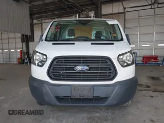 2016 Ford Transit Cargo z VIN 1FTYR1YM7GKB55438, wystawiony jako IAAI lot #42497571 z przebiegiem 66 612 mil mil oraz . Historia ofert i sprzedaży dostępna na DreamBid. Obrazek 13.