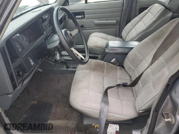 1994 Jeep Cherokee SE with VIN 1J4FJ28S4RL185992, listed as a Copart auction lot 80235064 with 208,126 mi miles and Salvage Title. Bid and sale history available at carsss.com. Image 7.