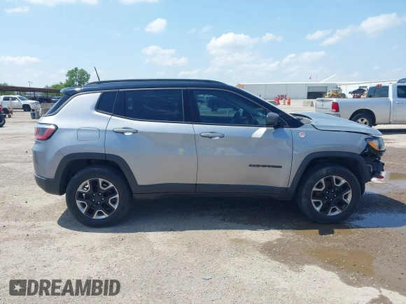 2018 Jeep Compass Trailhawk with VIN 3C4NJDDB2JT198784, listed as a IAAI auction lot 42405539 with 121,553 mi miles and . Bid and sale history available at DreamBid. Image 14.